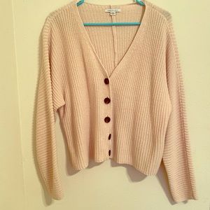 Cream sweater.